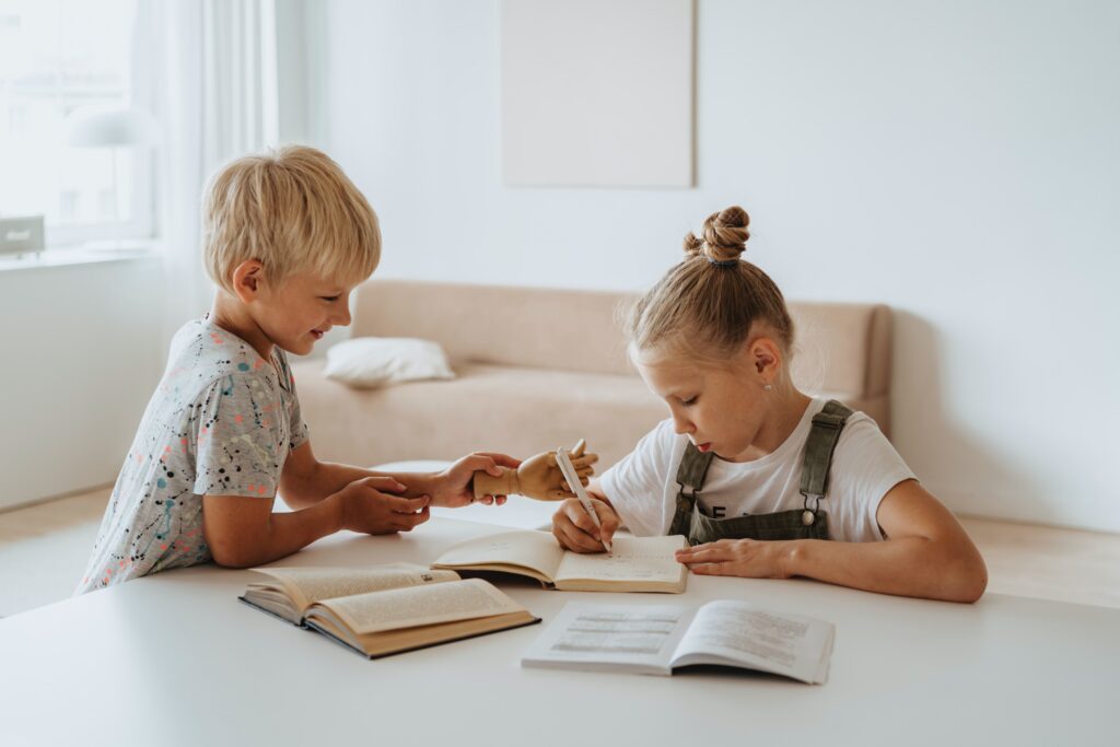 Children practicing handwriting.